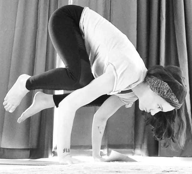 Crow pose in yoga